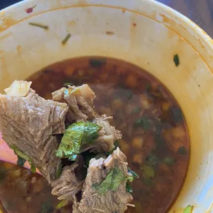 Beef Birria Order Shredded Beef Bowl with Broth. Meat was tough and in large pieces. Cannot cut with fork .