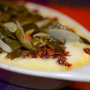 Queso Fundido (entrada) con rajas y (o) Chorizo