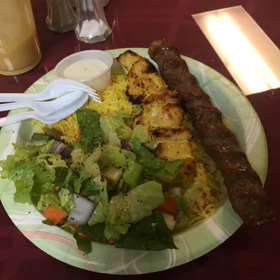 7$ plate of kabob and shishtaook chicken with a mango lasse. It is really good.