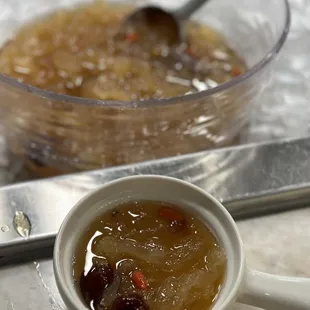 a bowl of soup and a spoon