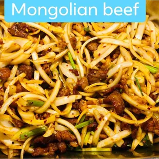a bowl of noodles with meat and onions