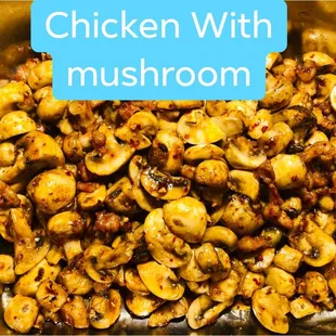 chicken with mushrooms in a pan