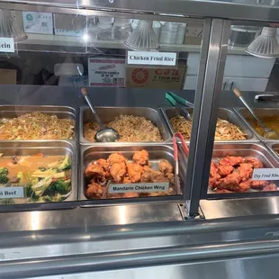 a variety of food items in a display case