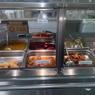a variety of food items in a display case
