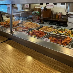 a buffet with a variety of food items