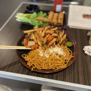 Garlic noodles saltado, w shaken beef and fries
