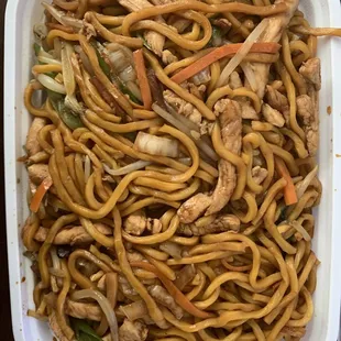 a bowl of noodles and chicken