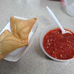 Samosas with spicy chili dip. Best samosas ever! $1 each.