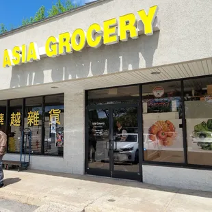 people walking in front of the store
