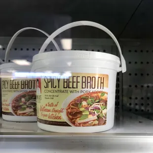 two buckets of beef broth