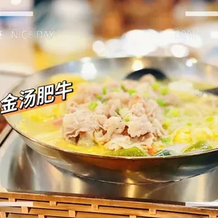 a bowl of food on a stove