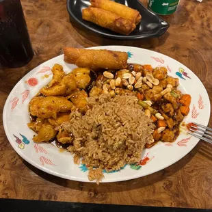 Combination special, orange chicken/ Kung pao chicken fried rice with an egg roll.