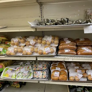 bread and pastries on shelves