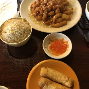 Honey Chicken with fried rice and egg rolls.