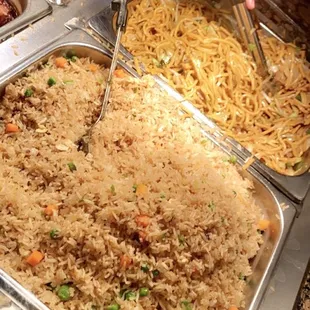 a person serving food from a buffet