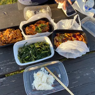 a picnic table full of food