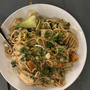 a plate of noodles and vegetables