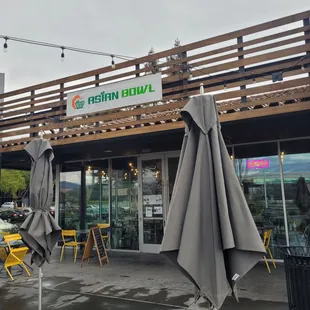 umbrellas and tables outside a restaurant