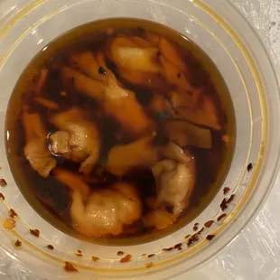 Wonton in chili oil. A personal favorite. Packs a ton of flavor.