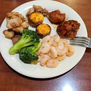 Broccoli, Pepper Chicken, Stuffed Mushrooms, General Tsos, And Buttered Shrimp.