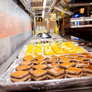 a variety of desserts on a tray