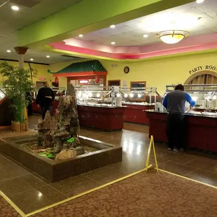 people standing in line to order food