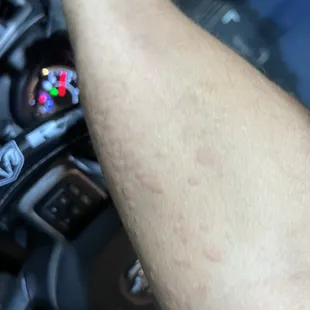 a person holding a steering wheel