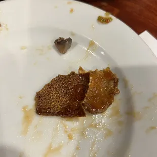 a half eaten piece of food on a plate