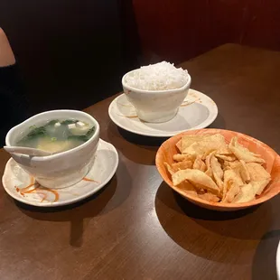 three bowls of soup and tortillas