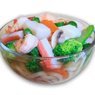 a bowl of shrimp, broccoli, carrots, and noodles