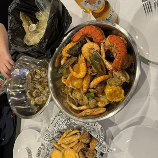 Mega boil, baby clams, Cajun fries, and fried mushrooms