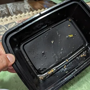 Chicken lo mein takeaway box with oodles of oil.