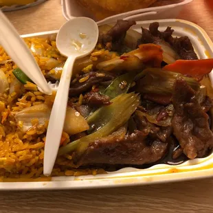 beef, peppers, onions, and rice