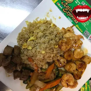 a plate of food with rice and vegetables