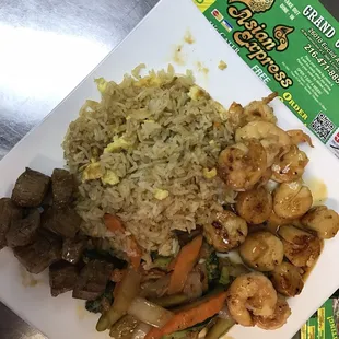 a plate of rice and vegetables