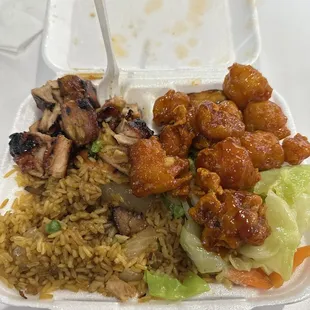 2 meat combo, orange chicken still hot, bourbon chicken, cabbage/veggies. Fried rice. Everything yummy!