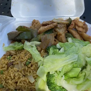 Chicken with onions and peppers, chicken fried rice, vegetables ... broccoli and cabbage