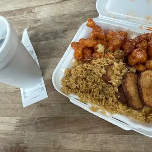 Orange chicken, rice, and potatoes super good and a soda
