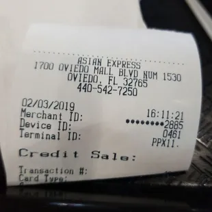 a receipt on a tray