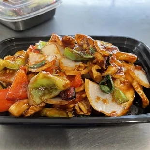 a plate of stir fried vegetables