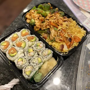 two trays of food on a table