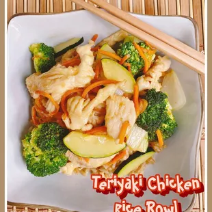 a plate of stir fried chicken and vegetables