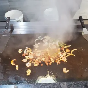 steaming vegetables on a grill