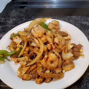 a plate of stir fried vegetables