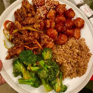 Crispy beef, sesame chicken, general Tso's chicken, broccoli in brown sauce, and fried rice