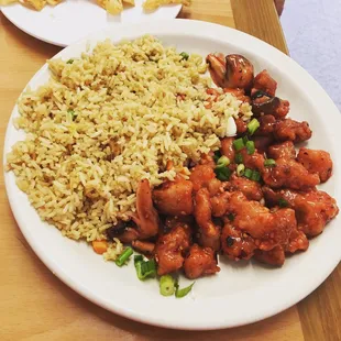 a plate of chicken and rice