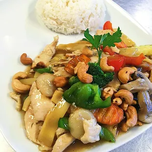 a plate of food with rice and vegetables