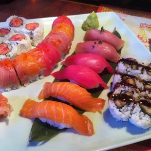Spicy tuna and Rainbow roll, three types of sushi, and Eel roll