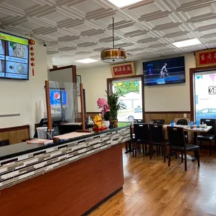 a restaurant with tables and chairs