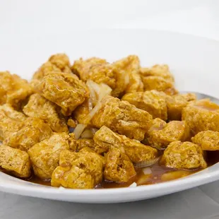 a bowl of tofu and sauce